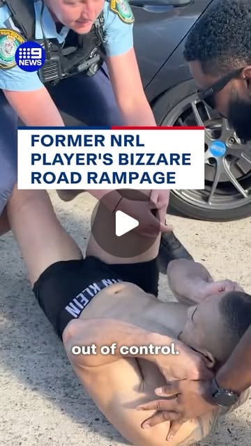 Police officers and a bystander restrain a man lying on the road beside a parked car, under a 9News caption reading Former NRL Player's Bizzare Road Rampage.