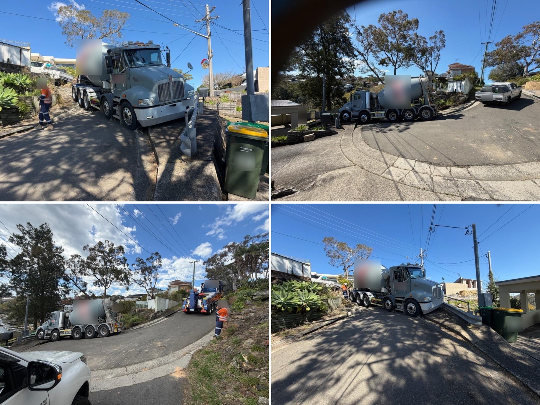 Concrete agitator truck stopped against a guardrail on a steep Shire street, with a heavy tow truck arriving. Plates and branding blurred.